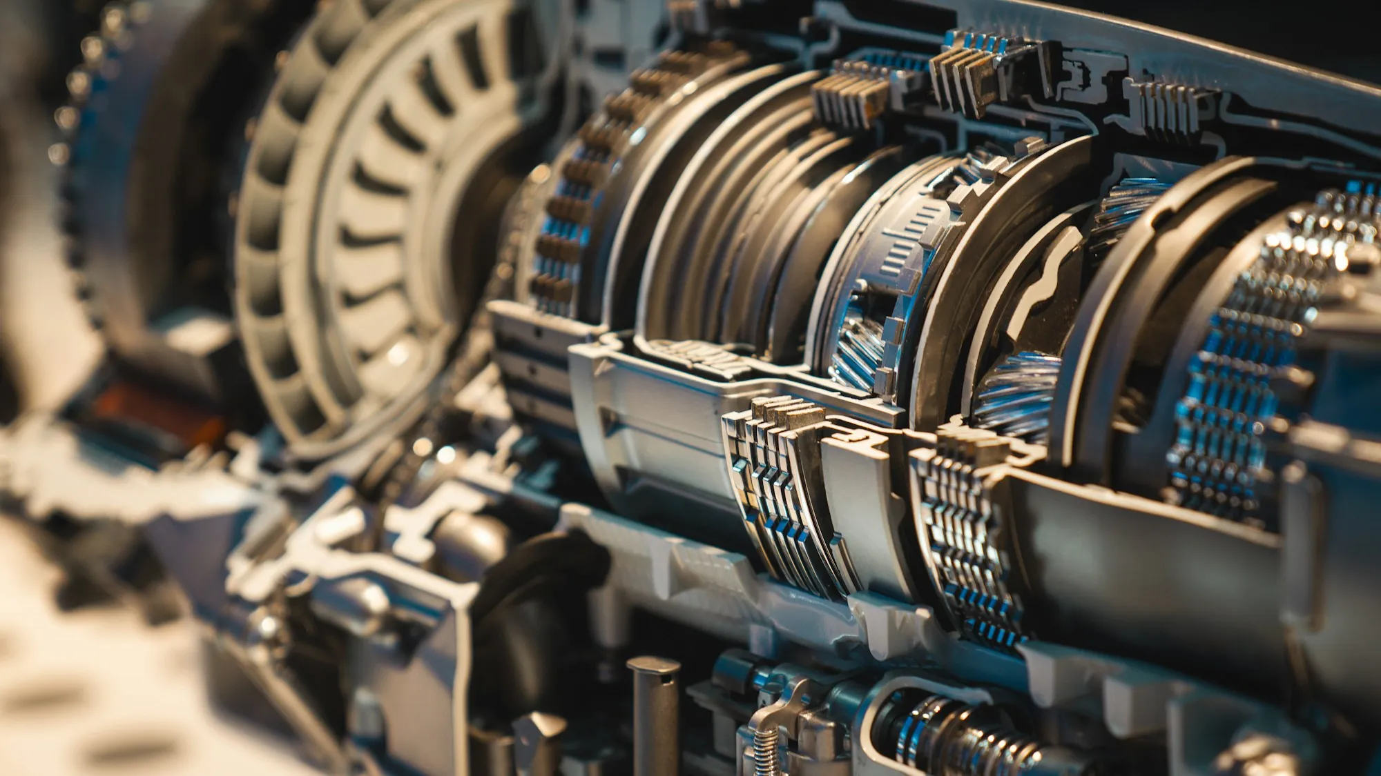 Exposed planetary gears and clutch packs inside a transmission